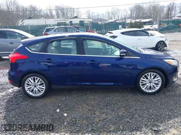 2017 Ford Focus Titanium with VIN 1FADP3N25HL272276, listed as a IAAI auction lot 41630327 with 110,899 mi miles and . Bid and sale history available at DreamBid. Image 13.
