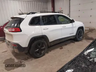 2016 Jeep Cherokee Latitude with VIN 1C4PJMCB0GW226093, listed as a IAAI auction lot 41683652 with 130,168 mi miles and . Bid and sale history available at DreamBid. Image 4.