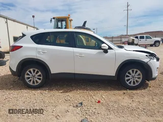 2016 Mazda CX-5 Sport with VIN JM3KE2BYXG0683318, listed as a IAAI auction lot 41777751 with 116,922 mi miles. Bid and sale history available at carsss.com. Image 13.