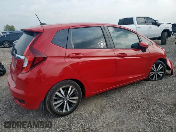 2018 Honda Fit EX-L with VIN 3HGGK5H97JM706911, listed as a Copart auction lot 57121595 with 117,375 mi miles and Salvage title. Bid and sale history available at DreamBid. Image 3.