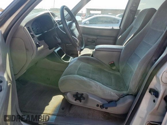 1999 Ford Explorer XLT z VIN 1FMZU32E6XZB27911, wystawiony jako Copart lot #58492495 z przebiegiem 337 889 mil mil oraz Szkoda całkowita • Salvage title. Historia ofert i sprzedaży dostępna na DreamBid. Obrazek 7.