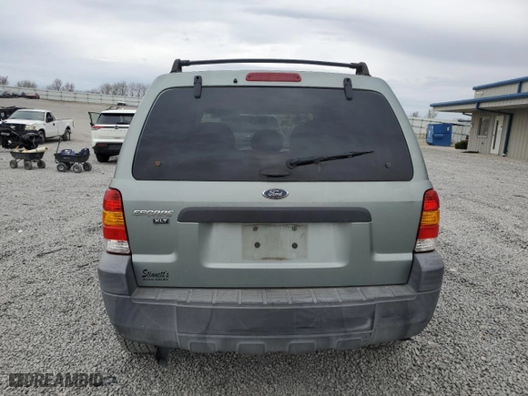 2005 Ford Escape XLT with VIN 1FMYU03125KA50658, listed as a Copart auction lot 51010405 with 194,285 mi miles and Salvage Title. Bid and sale history available at carsss.com. Image 6.