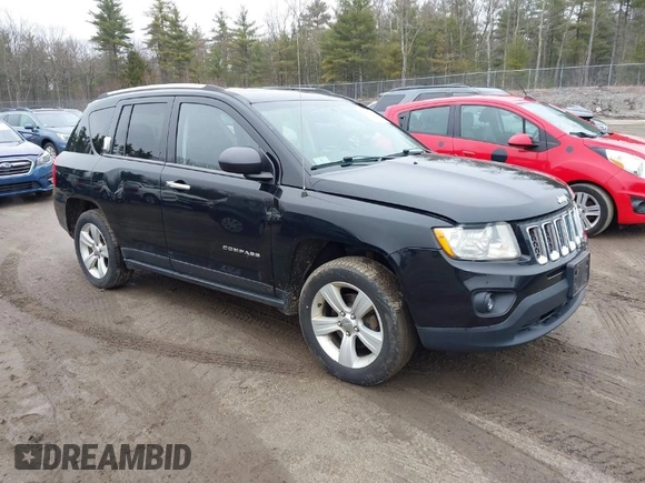 2013 Jeep Compass Latitude with VIN 1C4NJDEB2DD280393, listed as a IAAI auction lot 42028703 with 148,766 mi miles. Bid and sale history available at carsss.com. Image 1.