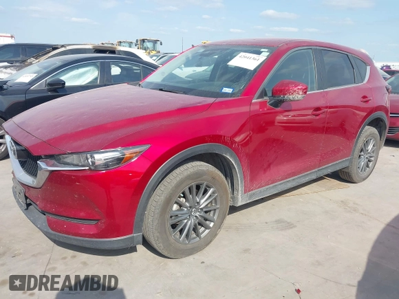 2017 Mazda CX-5 Touring with VIN JM3KFACL3H0195212, listed as a IAAI auction lot 42041361 with 57,377 mi miles and . Bid and sale history available at carsss.com. Image 18.