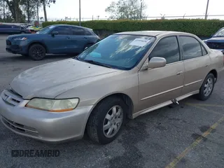 2001 Honda Accord EX z VIN 1HGCG66821A084618, wystawiony jako IAAI lot #41959020 z przebiegiem 272 671 mil mil oraz . Historia ofert i sprzedaży dostępna na DreamBid. Obrazek 17.