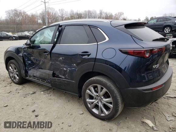 2023 Mazda CX-30 S Carbon Edition with VIN 3MVDMBCM5PM507711, listed as a Copart auction lot 48982325 with 42,759 mi miles and Salvage Title. Bid and sale history available at carsss.com. Image 2.