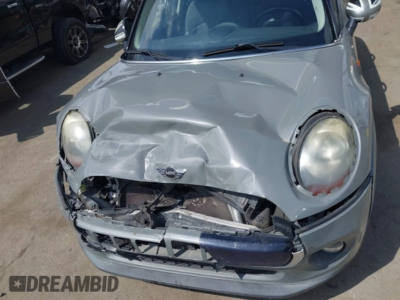 2016 MINI Hardtop 4 Door z VIN WMWXU1C52G2A93506, wystawiony jako IAAI lot #41920473 z przebiegiem 101 635 mil mil oraz . Historia ofert i sprzedaży dostępna na DreamBid. Obrazek 6.