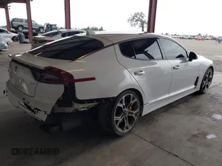 2019 Kia Stinger GT1 with VIN KNAE45LC4K6045047, listed as a IAAI auction lot 41489423 with 75,845 mi miles and . Bid and sale history available at DreamBid. Image 4.