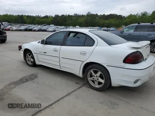 2000 Pontiac Grand Am GT with VIN 1G2NW52E2YM799735, listed as a Copart auction lot 51782455 with 181,850 mi miles and Salvage title. Bid and sale history available at DreamBid. Image 2.