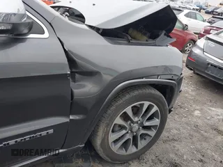 2017 Jeep Grand Cherokee Overland with VIN 1C4RJFCG8HC772837, listed as a IAAI auction lot 41304895 with 71,338 mi miles. Bid and sale history available at carsss.com. Image 19.