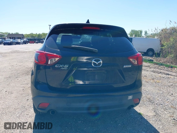 2013 Mazda CX-5 Grand Touring with VIN JM3KE4DE6D0127601, listed as a IAAI auction lot 42143558 with 95,719 mi miles and . Bid and sale history available at DreamBid. Image 16.