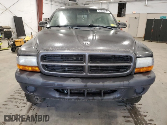 2003 Dodge Dakota z VIN 1D7GG16X23S204317, wystawiony jako Copart lot #54830745 z przebiegiem 139 508 mil mil oraz Szkoda całkowita • Salvage title. Historia ofert i sprzedaży dostępna na DreamBid. Obrazek 5.