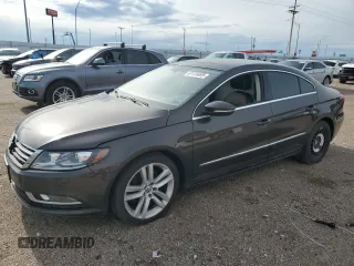 2015 Volkswagen CC Lux z VIN WVWRN7AN0FE801115, wystawiony jako Copart lot #61124495 z przebiegiem 137 916 mil mil oraz Czysty tytuł • Clean title. Historia ofert i sprzedaży dostępna na DreamBid. Obrazek 1.