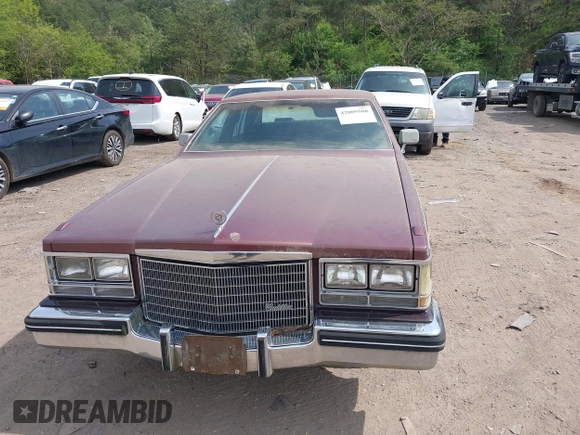 1985 Cadillac Seville z VIN 1G6KS6989FE821515, wystawiony jako IAAI lot #42009508 z przebiegiem 13 600 mil mil oraz . Historia ofert i sprzedaży dostępna na DreamBid. Obrazek 6.