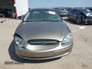 2002 Ford Taurus SES Standard with VIN 1FAFP55U52A156214, listed as a IAAI auction lot 41803668 with 31,693 mi miles. Bid and sale history available at carsss.com. Image 12.