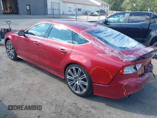2013 Audi A7 Prestige with VIN WAU2GAFC0DN023439, listed as a IAAI auction lot 42605597 with 173,364 mi miles and . Bid and sale history available at DreamBid. Image 3.
