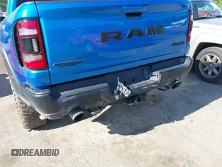 2021 Ram 1500 TRX z VIN 1C6SRFU91MN900450, wystawiony jako IAAI lot #42102724 z przebiegiem 80 071 mil mil oraz . Historia ofert i sprzedaży dostępna na DreamBid. Obrazek 6.
