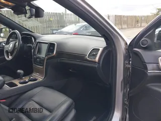 2014 Jeep Grand Cherokee Limited with VIN 1C4RJEBG0EC547674, listed as a IAAI auction lot 42198600 with 122,969 mi miles and . Bid and sale history available at DreamBid. Image 5.