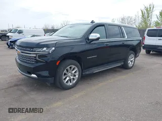 2023 Chevrolet Suburban Premier z VIN 1GNSKFKD3PR472907, wystawiony jako IAAI lot #41993577 z przebiegiem 33 653 mil mil oraz . Historia ofert i sprzedaży dostępna na DreamBid. Obrazek 2.