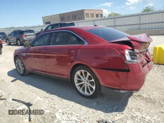 2013 Ford Taurus Limited with VIN 1FAHP2F80DG167100, listed as a Copart auction lot 57815055 with 198,364 mi miles and Salvage title. Bid and sale history available at DreamBid. Image 2.