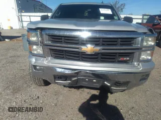 2014 Chevrolet Silverado 1500 LT with VIN 1GCVKREC7EZ120159, listed as a IAAI auction lot 41191282 with 206,836 mi miles and . Bid and sale history available at DreamBid. Image 6.