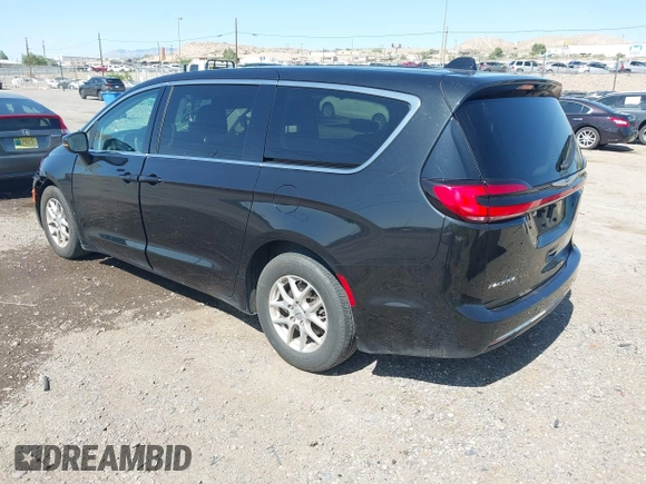 2023 Chrysler Pacifica Touring L with VIN 2C4RC1BG9PR628170, listed as a IAAI auction lot 42515590 with 41,987 mi miles and . Bid and sale history available at DreamBid. Image 3.