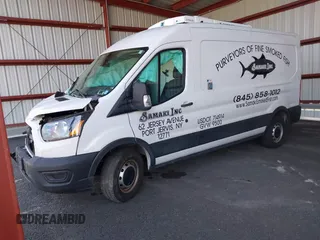2021 Ford Transit Cargo with VIN 1FTBR1C86MKA10399, listed as a IAAI auction lot 42074285 with 55,572 mi miles and . Bid and sale history available at DreamBid. Image 17.