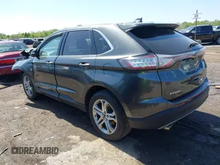 2015 Ford Edge Titanium z VIN 2FMPK4K83FBB30411, wystawiony jako IAAI lot #42230235 z przebiegiem 69 094 mil mil oraz . Historia ofert i sprzedaży dostępna na DreamBid. Obrazek 3.