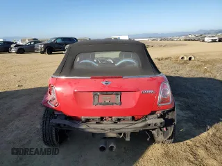 2014 MINI Convertible S with VIN WMWZP3C54ET298129, listed as a Copart auction lot 88523065 with 54,788 mi miles and Salvage title. Bid and sale history available at DreamBid. Image 6.