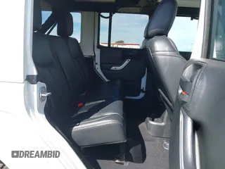 2017 Jeep Wrangler Unlimited Sahara with VIN 1C4BJWEG5HL588535, listed as a IAAI auction lot 42013571 with 70,012 mi miles. Bid and sale history available at carsss.com. Image 8.