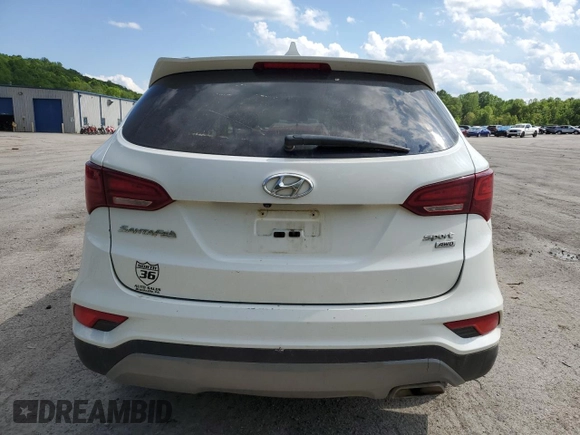 2017 Hyundai Santa Fe 2.4L z VIN 5XYZUDLB7HG388382, wystawiony jako Copart lot #57167315 z przebiegiem 128 724 mil mil oraz Szkoda całkowita • Salvage title. Historia ofert i sprzedaży dostępna na DreamBid. Obrazek 6.