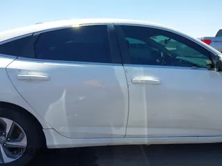 2019 Honda Insight LX z VIN 19XZE4F17KE005173, wystawiony jako IAAI lot #42442199 z przebiegiem 128 003 mil mil oraz . Historia ofert i sprzedaży dostępna na DreamBid. Obrazek 13.