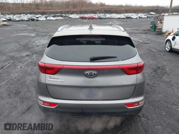 2017 Kia Sportage LX with VIN KNDPMCAC2H7238741, listed as a IAAI auction lot 41973333 with 64,714 mi miles and . Bid and sale history available at carsss.com. Image 16.