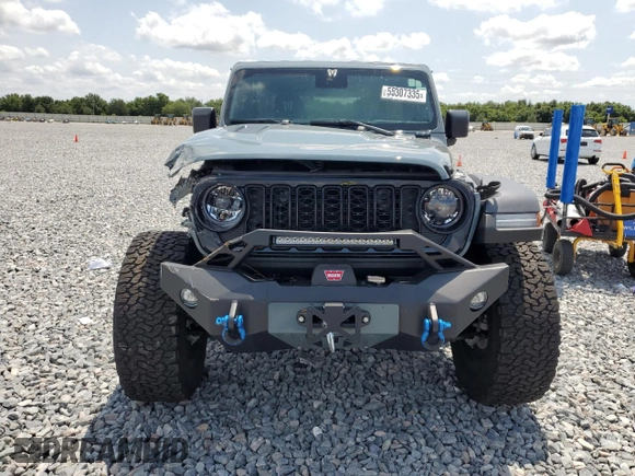 2024 Jeep Wrangler Sport S with VIN 1C4PJXDG3RW229567, listed as a Copart auction lot 55307335 with 7,797 mi miles and Salvage Title. Bid and sale history available at DreamBid. Image 5.