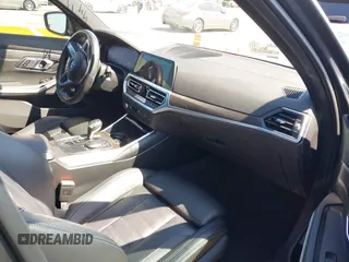 2019 BMW 3 Series 330i with VIN WBA5R1C55KAK11925, listed as a IAAI auction lot 41982248 with 62,711 mi miles and . Bid and sale history available at DreamBid. Image 5.