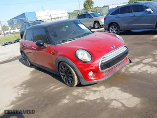 2015 MINI Cooper Hardtop 4 Door with VIN WMWXS5C56FT833206, listed as a IAAI auction lot 42104436 with 72,413 mi miles. Bid and sale history available at carsss.com. Image 1.