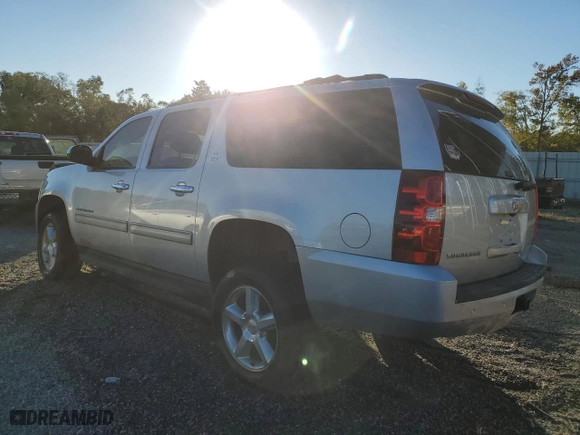 2014 Chevrolet Suburban LT with VIN 1GNSKJE76ER208747, listed as a Copart auction lot 74501524 with 196,971 mi miles and Salvage Title. Bid and sale history available at carsss.com. Image 2.