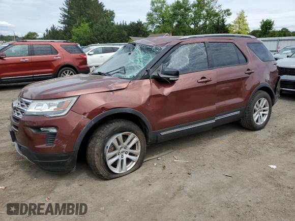 2018 Ford Explorer XLT with VIN 1FM5K8D81JGA11477, listed as a Copart auction lot 58386475 with 93,818 mi miles and Salvage title. Bid and sale history available at DreamBid. Image 1.