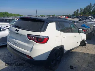 2021 Jeep Compass Altitude with VIN 3C4NJDBB2MT596181, listed as a IAAI auction lot 42026716 with 69,526 mi miles and . Bid and sale history available at DreamBid. Image 4.