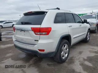 2012 Jeep Grand Cherokee Limited with VIN 1C4RJEBG4CC229571, listed as a IAAI auction lot 41565669 with 221,268 mi miles. Bid and sale history available at carsss.com. Image 4.