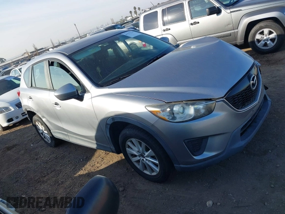 2014 Mazda CX-5 Sport with VIN JM3KE2BE9E0330345, listed as a IAAI auction lot 41377335 with 103,340 mi miles and . Bid and sale history available at carsss.com. Image 13.