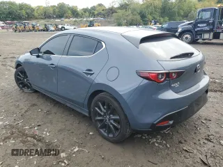 2023 Mazda 3 S Carbon Edition with VIN JM1BPBLM3P1618402, listed as a Copart auction lot 73179284 with 7,318 mi miles and Salvage title. Bid and sale history available at DreamBid. Image 2.