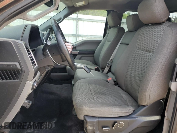2016 Ford F-150 XLT with VIN 1FTFX1EG2GFB17717, listed as a Copart auction lot 55575825 with 122,867 mi miles and Salvage title. Bid and sale history available at DreamBid. Image 7.