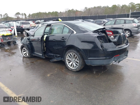 2014 Ford Taurus Limited with VIN 1FAHP2F87EG130532, listed as a IAAI auction lot 41618112 with 118,474 mi miles. Bid and sale history available at carsss.com. Image 3.