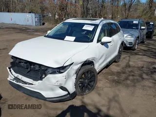 2022 Mazda CX-9 Touring Plus with VIN JM3TCBAY7N0609234, listed as a IAAI auction lot 41985673 with 37,962 mi miles. Bid and sale history available at carsss.com. Image 2.
