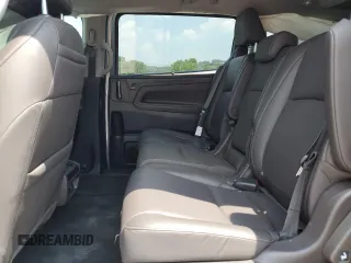 2023 Honda Odyssey Touring z VIN 5FNRL6H8XPB037385, wystawiony jako Copart lot #59461215 z przebiegiem 32 150 mil mil oraz Szkoda całkowita • Salvage title. Historia ofert i sprzedaży dostępna na DreamBid. Obrazek 11.