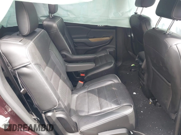 2017 GMC Acadia Denali with VIN 1GKKNXLS7HZ216729, listed as a IAAI auction lot 42256467 with 87,302 mi miles and . Bid and sale history available at DreamBid. Image 8.