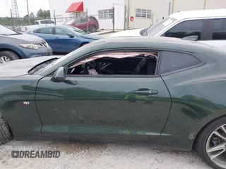 2020 Chevrolet Camaro 1LT with VIN 1G1FB1RS6L0125323, listed as a IAAI auction lot 42101034 with 124,474 mi miles and . Bid and sale history available at DreamBid. Image 14.