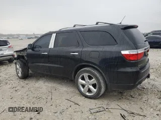 2013 Dodge Durango Citadel with VIN 1C4SDJET0DC616002, listed as a Copart auction lot 54677325 with 174,131 mi miles and Salvage title. Bid and sale history available at DreamBid. Image 2.