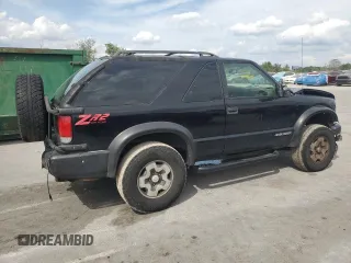 1999 Chevrolet Blazer LS with VIN 1GNCT18W6XK224253, listed as a Copart auction lot 50708405 with 209,711 mi miles and Salvage title. Bid and sale history available at DreamBid. Image 3.